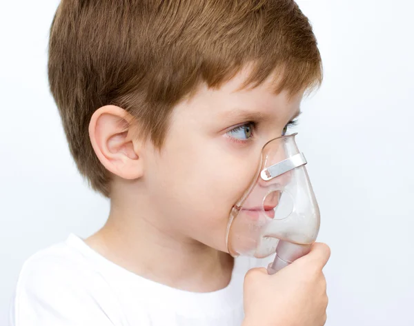 Boy with an inhaler — Stock Photo, Image