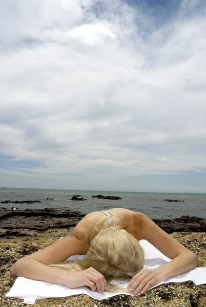 Model lying on  beach — Stock Photo, Image