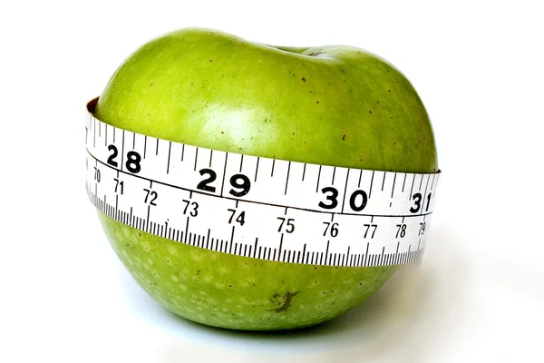 Apple with a measuring tape — Stock Photo, Image