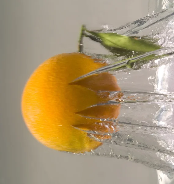 Orange in water splash — Stock Photo, Image