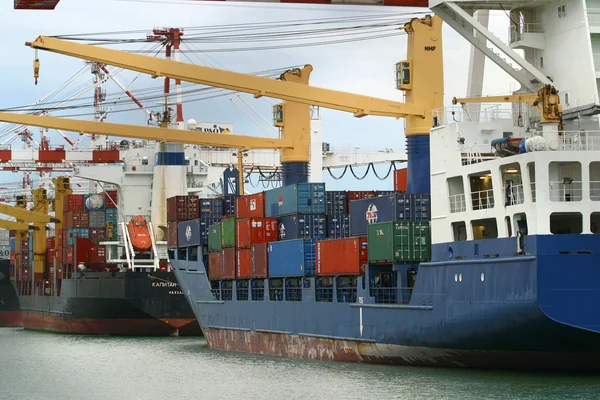 Cargo ships at harbor — Stock Photo, Image