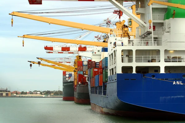 Cargo ships at harbor — Stock Photo, Image