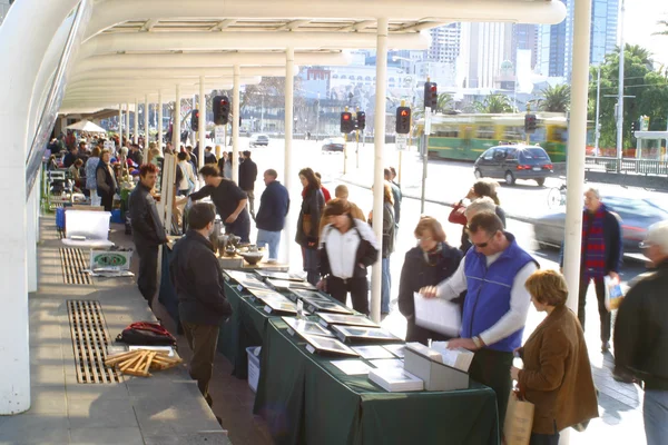 People gathering in market — Stock Photo, Image