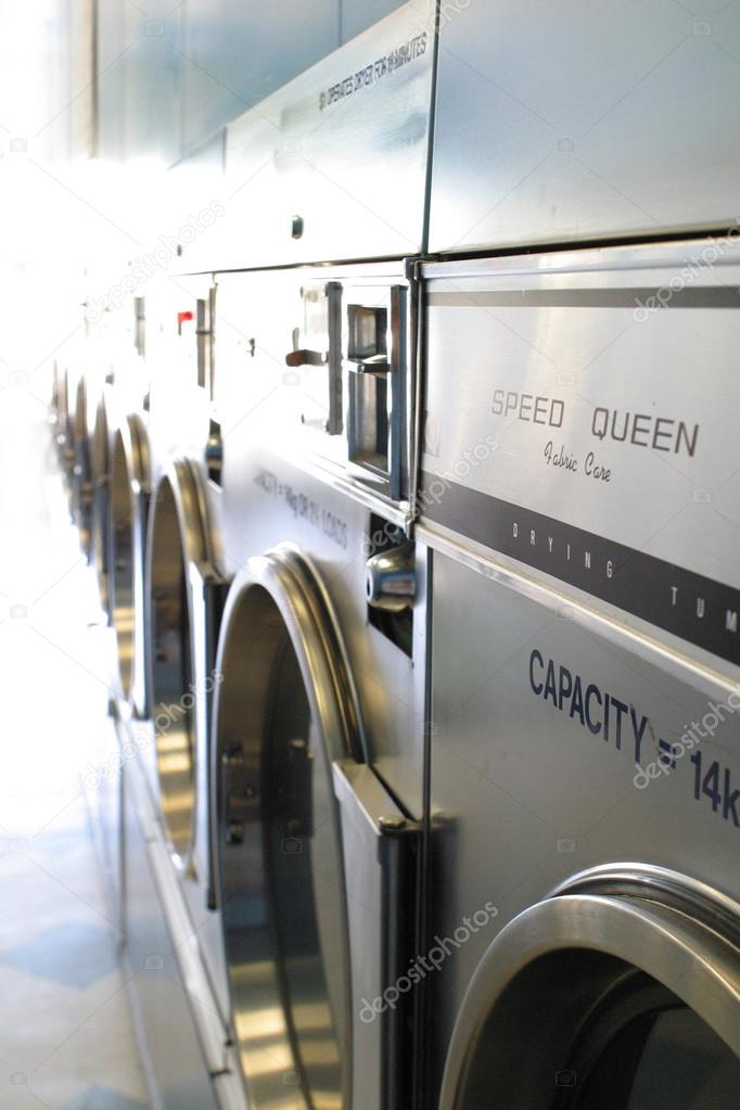 Row of industrial washing machines
