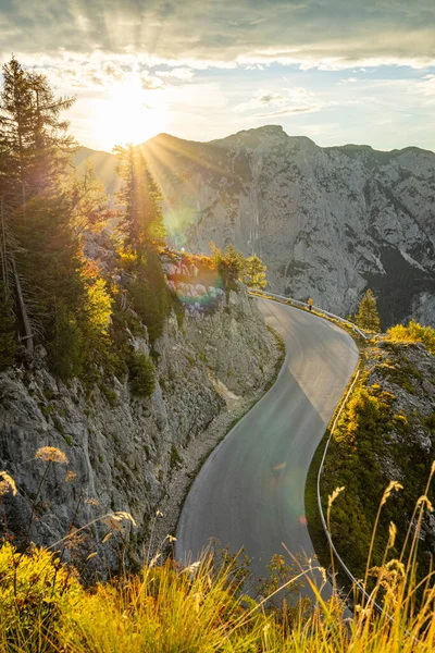 Magical sunrise from Loser-Panoramastrasse with vibrant autumn colours. View at rmorning to the austrian Alps