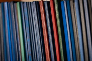 books side by side in the library, world book