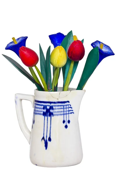 Wooden flowers in the jug — Stock Photo, Image