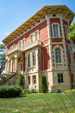 Ottawa, Illinois, USA - August 16th 2022 - Beautiful and ornate italianate mansion build in 1855 and surrounding gardens.