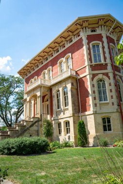 Ottawa, Illinois, USA - August 16th 2022 - Beautiful and ornate italianate mansion build in 1855 and surrounding gardens.