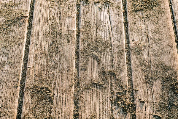 Arena marina sobre tablas en la playa. Fondo de madera tropical —  Fotos de Stock