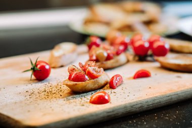 Traditional Italian appetizer. Bruschettas bread with chopped tomato and dried seasoning