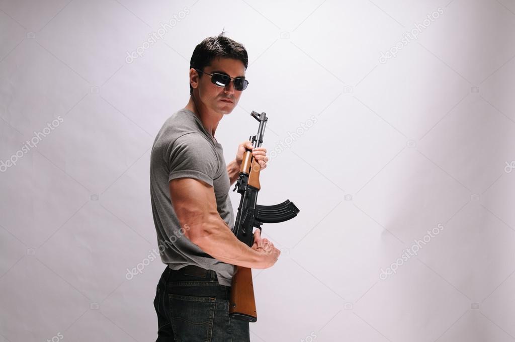 Handsome man with rifle