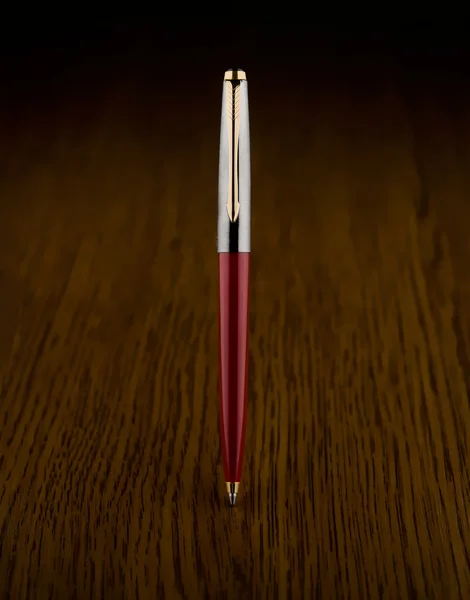 Red with gold pen