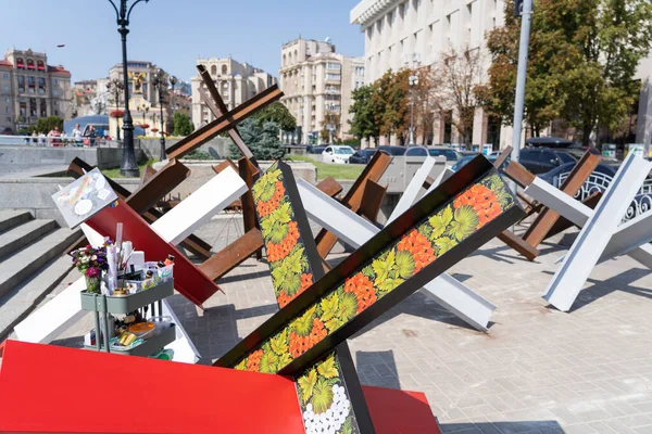Kiev, Ukraine August 21, 2022: Anti-Tank Hedgehog painted with Ukrainian ornament on Independence Square, Independence Day Ukraine