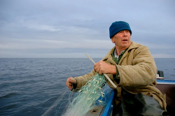 Old fisherman — Stock Photo, Image