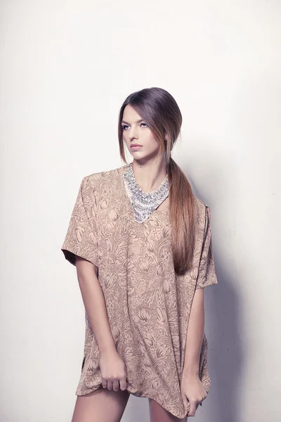 Beautiful high fashion model with necklace isolated on white background — Stock Photo, Image