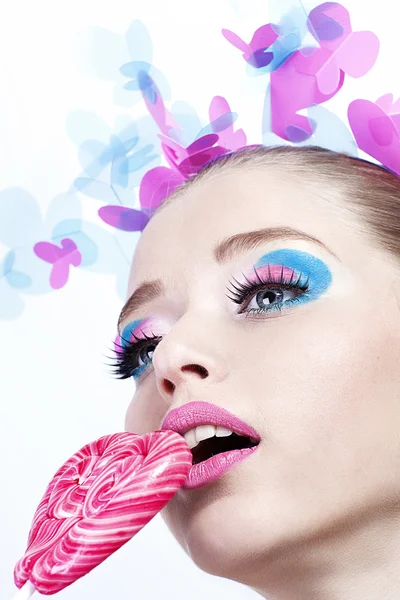 Woman eating lollipop — Stock Photo, Image