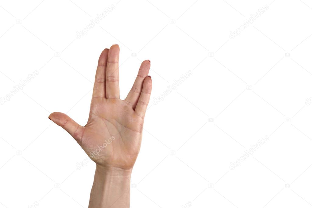 A man hand doing the Vulcan salute on a white background. Vulcan hand salute against. Spock hand. Alpha.