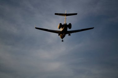 10-05-2021 Riga, Latvia Silhouette of a passenger plane taking off from the airport.