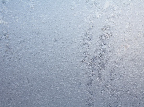 Frostiges natürliches Muster am Winterfenster — Stockfoto