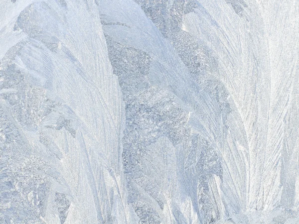 Frostiges natürliches Muster am Winterfenster — Stockfoto