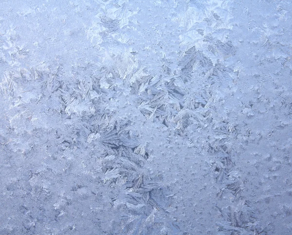 Frosty natural pattern on winter window Stock Picture