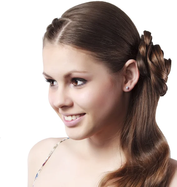 The beautiful young girl with a long fair hair posing  in studio — Stock Photo, Image
