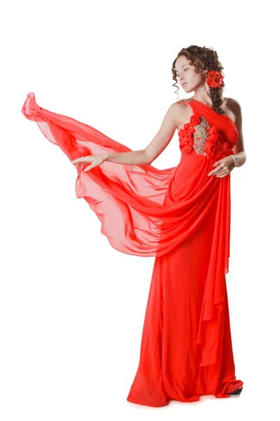 Giovane donna in abito rosso isolato su sfondo bianco — Foto Stock