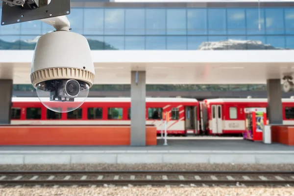 CCTV Camera Operating with train station in background — Stock Photo, Image