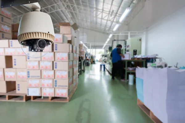 CCTV Camera Operating inside warehouse or factory — Stock Photo, Image