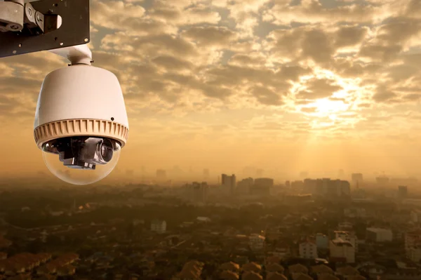 CCTV Camera Operating with city in background — Stock Photo, Image