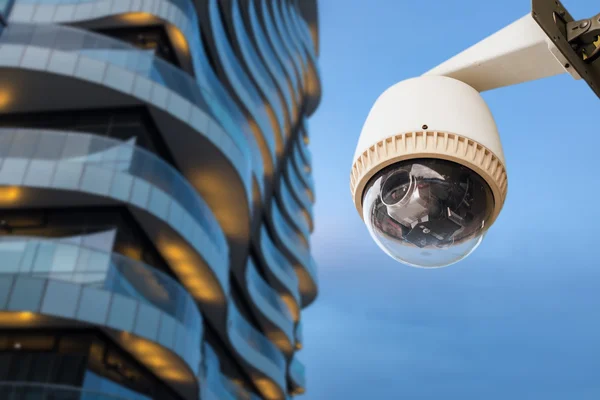 CCTV camera or surveillance operating outside office balcony — Stock Photo, Image