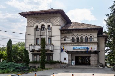 Novaci, Gorj County, Romania  July 24, 2022:  The headquarters of the house of culture in Novaci, Gorj, Romania
