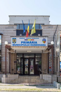 Hunedoara, Hunedoara County - July 22, 2022: Building of City Hall in Hunedoara, Transylvania, Romania.