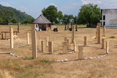 Polovragi, Gorj County, Romania  July 24, 2022:  Wooden sculptures with Dacian themes in the Polovragi sculpture camp, Gorj, Romania. 