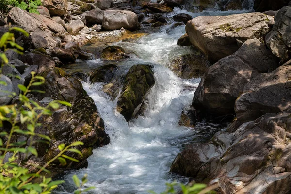 Landscape on the upper course of the river Gilort, Gorj, Romania. Mountain river with clear and clean water.