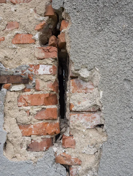 古いと割れたレンガの壁の背景のクローズアップ — ストック写真