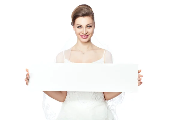 Bride is holding a billboard. — Stock Photo, Image