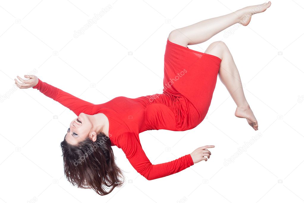 Woman in red dress falls.