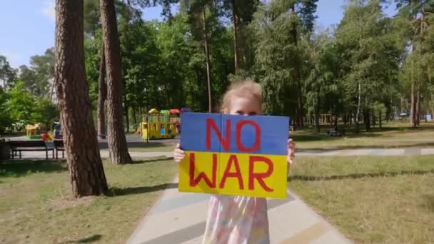 Ukrainian Girl Holds Poster Inscription War Her Hands — Stockvideo