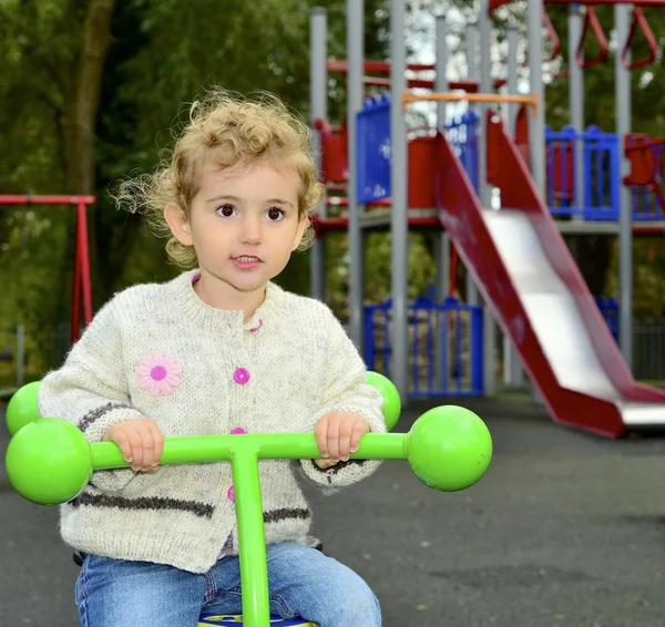 Young child playing at the playground — Stock Photo, Image