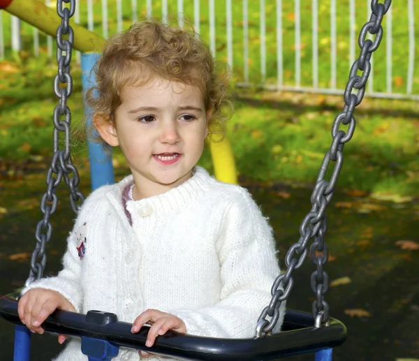 Young child on a swing Stock Image