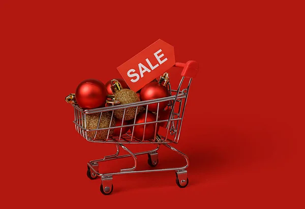 Mini Cart Red Christmas Balls Advertising Discount Red Background — Stock Photo, Image