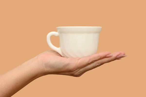 Female Hand Holds White Cup Minimalism Close Beige Background Concept — Stock Photo, Image