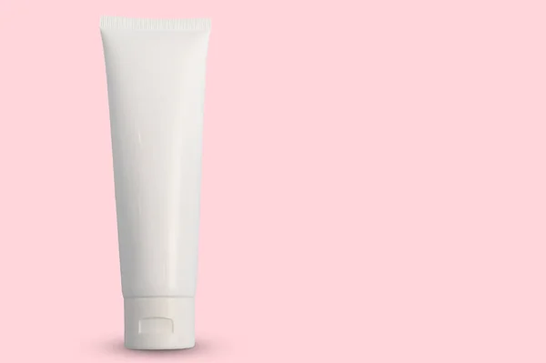 Contenitore Bianco Con Crema Corpo Cosmetica Sfondo Rosa Con Posto — Foto Stock