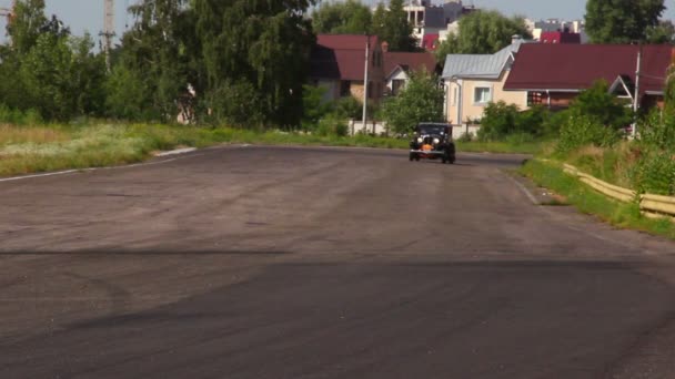 Vintage cars Rockne Six 75 Studebaker and Ford Model A on the road — Stock Video