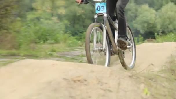 Bicycle action BMX circuit race two riders compete against — Stock Video