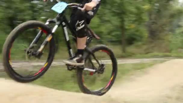 Hard finish for BMX bicycle challenge competitor comes first — Stock Video