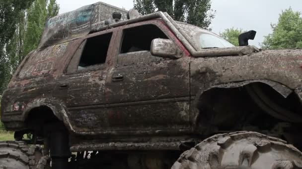 Huge big foot vehicle in dirt mud — Stock Video