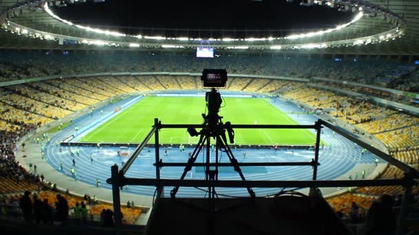 TV camera shooting stadium sport event — Stock Video